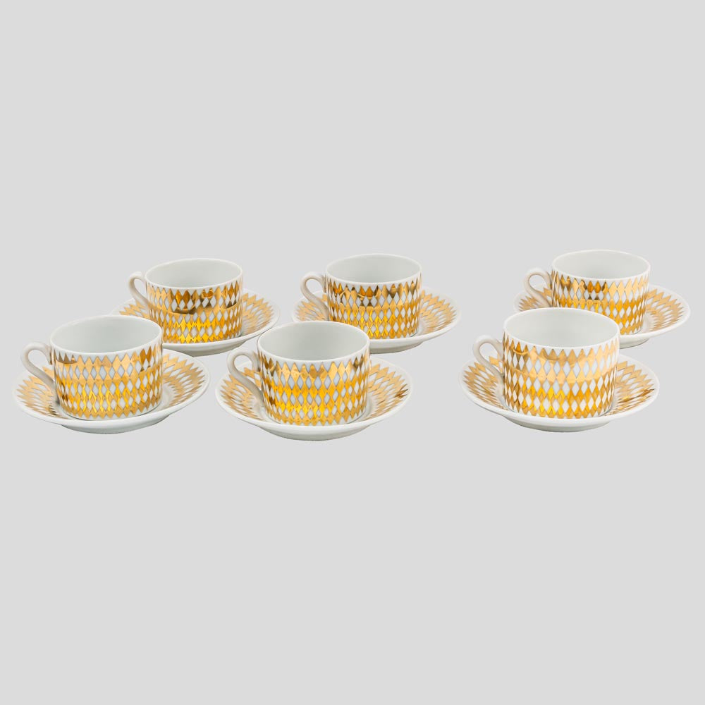 Set of six Fornasetti tea cups and saucers