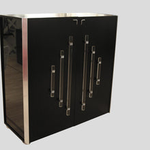 Load image into Gallery viewer, A pair of tall black lacquer cabinets
