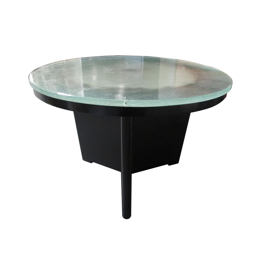 A glass lit coffee table by Greta Magnusson-Grossman