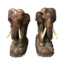 Load image into Gallery viewer, A pair of carved wood elephants