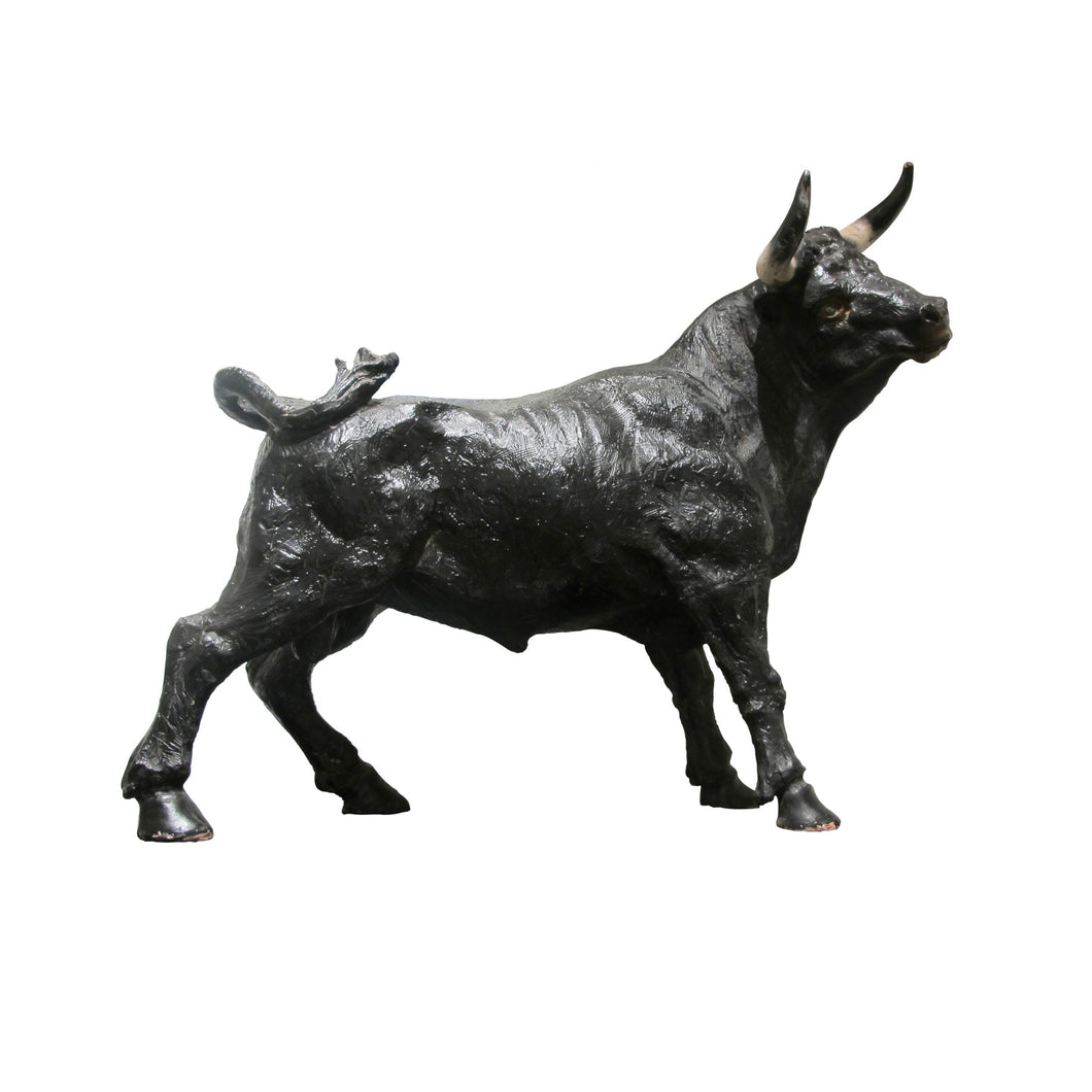 A mid century plaster sculpture of a bull