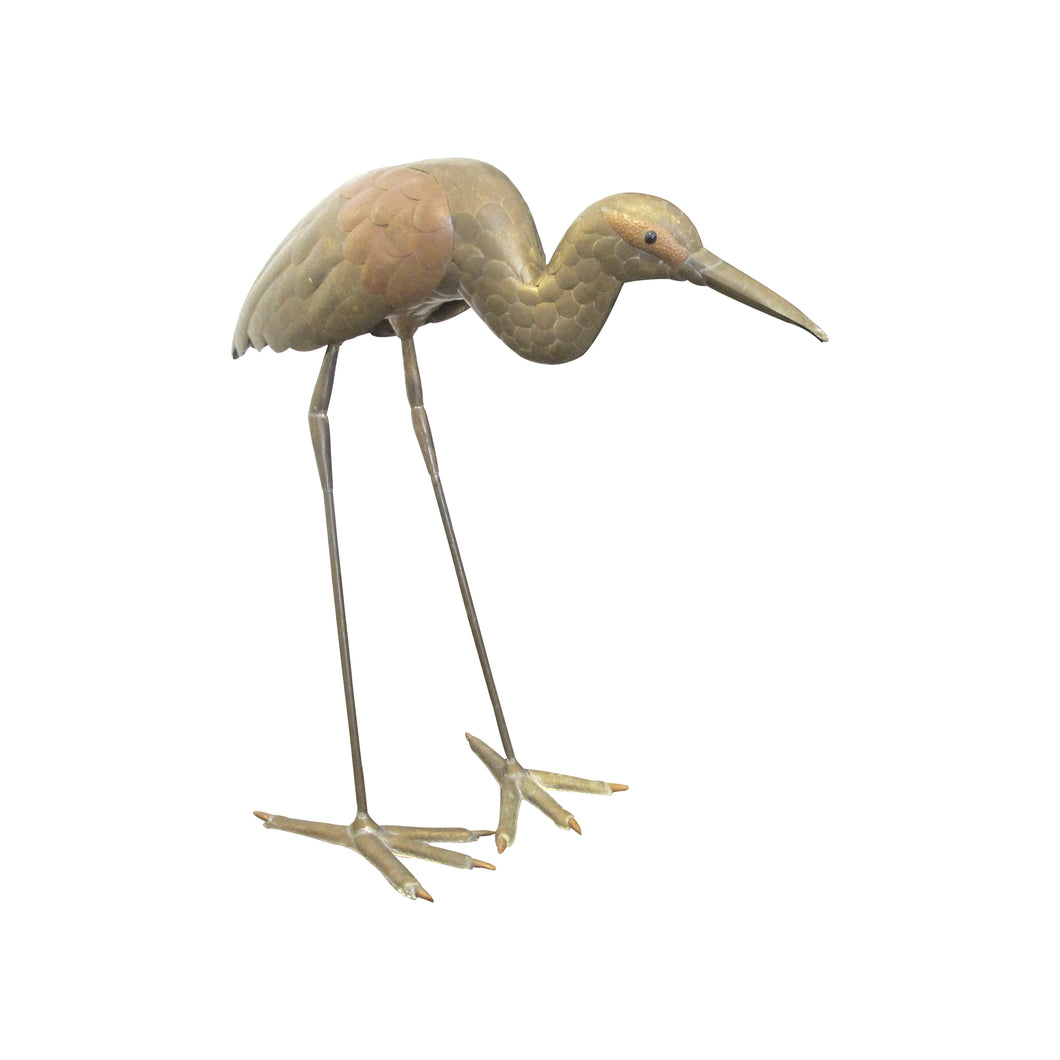 A brass and copper Heron sculpture by Sergio Bustamante
