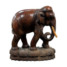 Load image into Gallery viewer, A pair of carved wood elephants