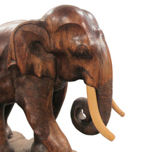 Load image into Gallery viewer, A pair of carved wood elephants