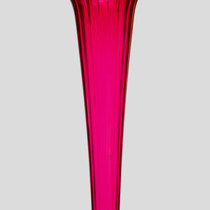 A Tall ruby color blown glass flared single trumpet shape