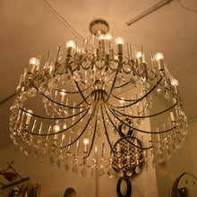 Load image into Gallery viewer, A large silver plated Gaetano Sciolari chandelier
