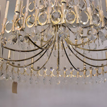 Load image into Gallery viewer, A large silver plated Gaetano Sciolari chandelier
