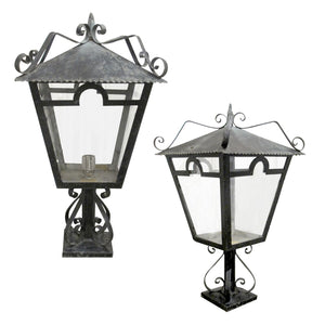 A Pair of French Wrought Iron Outdoor Pillar Lanterns, circa 1950