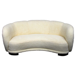1930s Danish curved sofa, newly upholstered in a lamb fabric