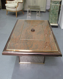 A granite bar coffee table with central lift, 1970's