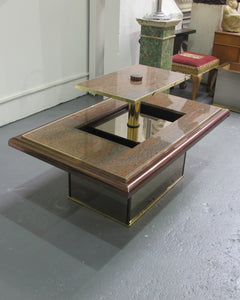 A granite bar coffee table with central lift, 1970's