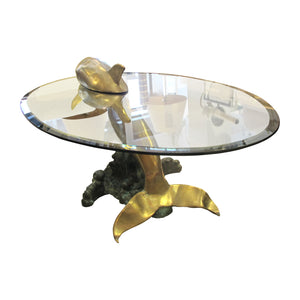 1960s French Brass Coffee Table in the shape of a Dolphin with an Oval Glass Top