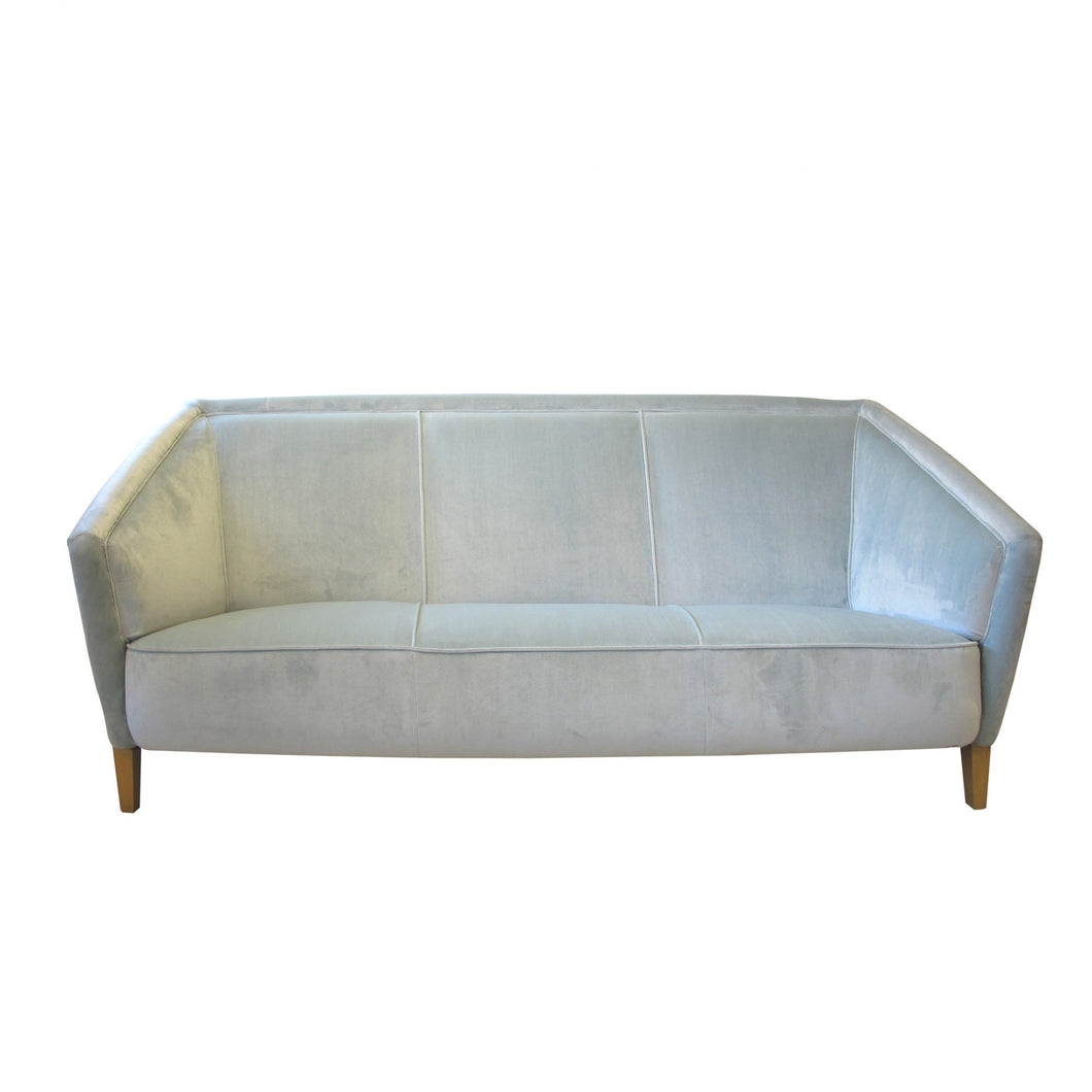 A 1940's Swedish sofa upholstered in a light blue velvet fabric
