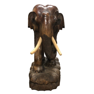 A pair of carved wood elephants