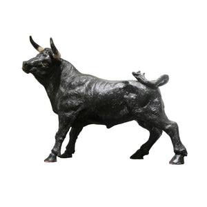 A mid century plaster sculpture of a bull