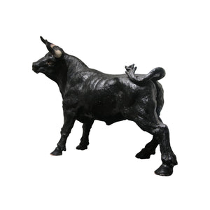 A mid century plaster sculpture of a bull