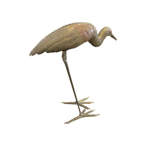 A brass and copper Heron sculpture by Sergio Bustamante